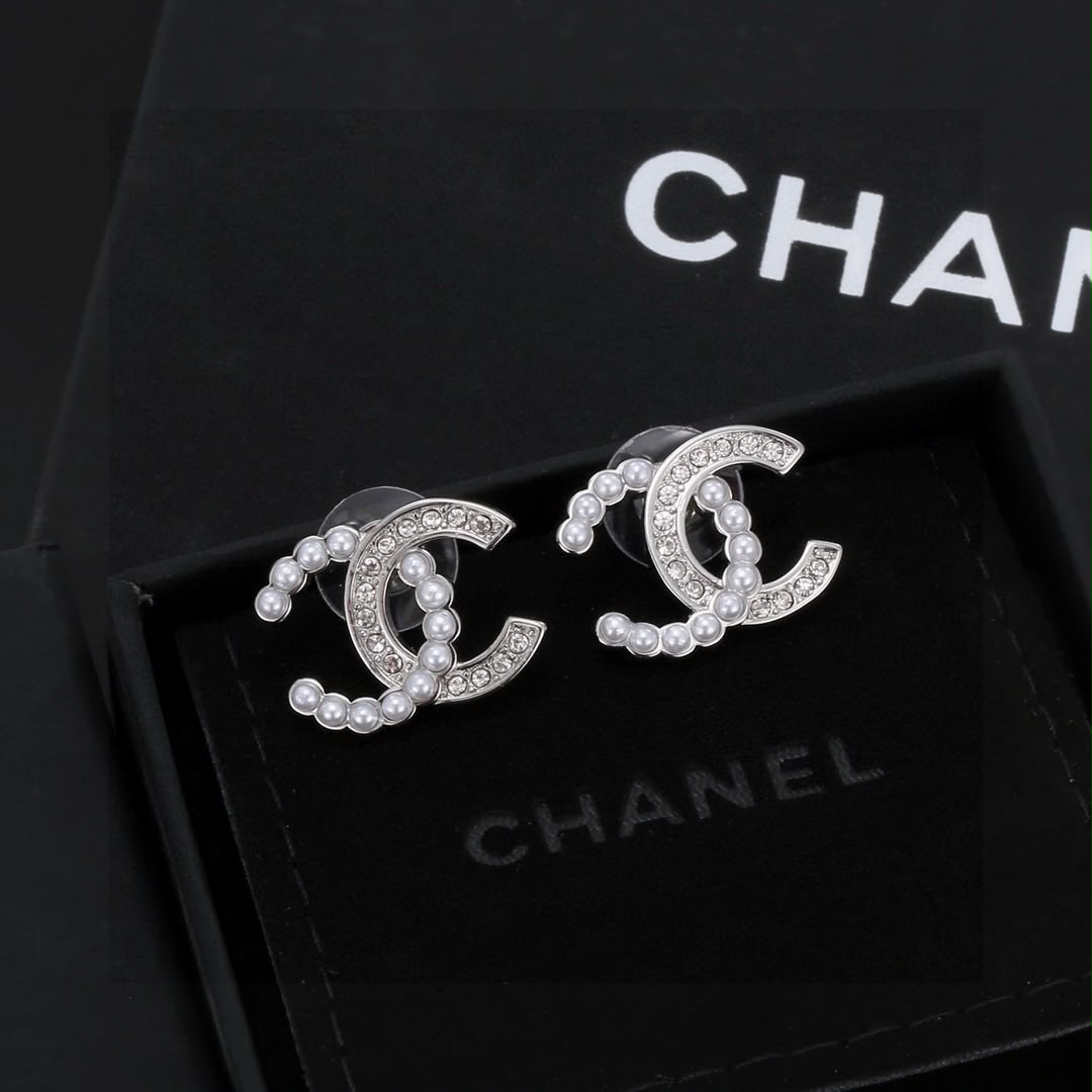 Cc earrings Chanel Silver